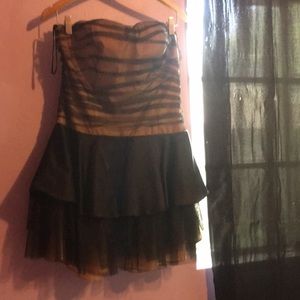 A cream and black dress